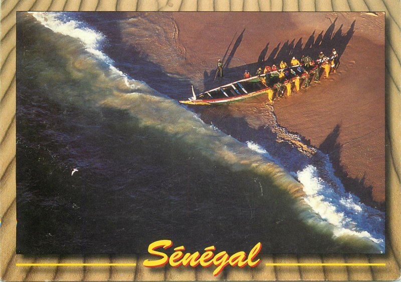 Postcard Senegal people launching boat to sail aerial view