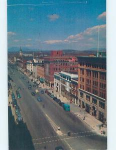 1950's OLD CARS BY SHOPS ALONG STREET AT SHERATON HOTEL Pittsfield MA c1374