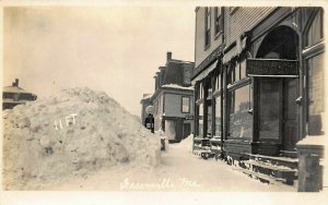 11 Feet of Snow Bank in Greenville ME Storefronts Real Photo Postcard