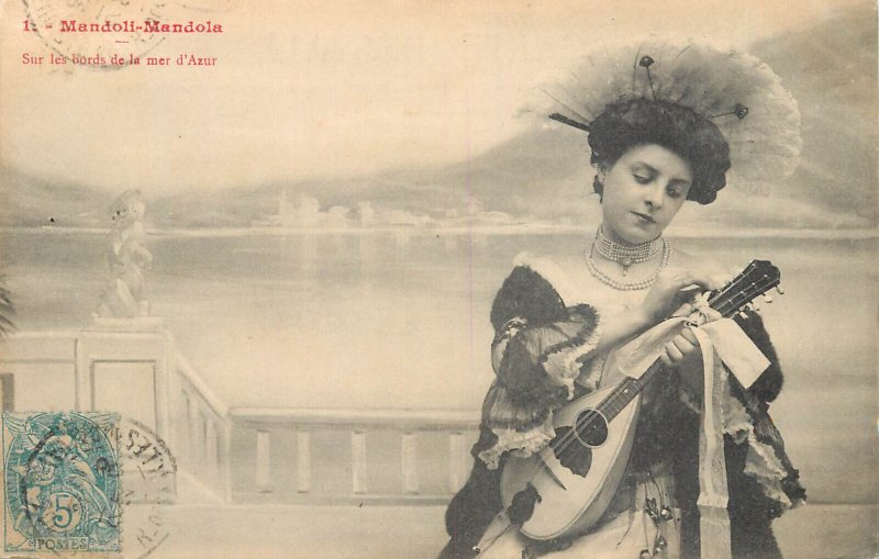 Mandolin lady Mandoli-Mandola sur les bords de la mer d`Azur postcard, France