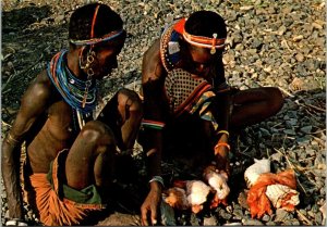 VINTAGE CONTINENTAL SIZE POSTCARD ELMOLO FAMILY PREPARING A MEAL TURKANA KENYA