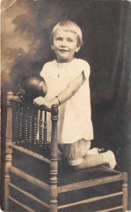 1920s RPPC Real Photo Postcard Young Girl On Chair with Ball Dorothy Miller