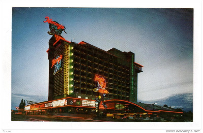 SOUTH LAKE TAHOE, Nevada; Harvey's Resort Hotel at dusk, 40-60s