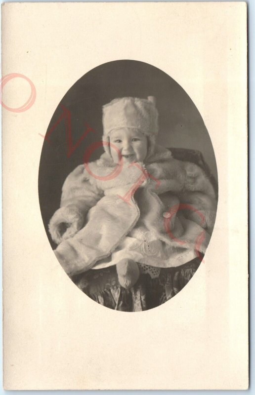 c1910s Adorable Baby Boy Smile RPPC Winter Coat Hat Cute Laugh Real Photo A140