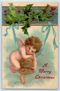 1908 Christmas Angel Hugging Bell Holly Berries Embossed Oklahoma OK Postcard