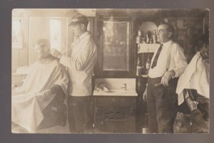 Orleans IOWA RPPC c1910 INTERIOR BARBER SHOP Giving HAIR CUT nr Lake Okoboji IA
