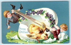 EASTER GREETINGS Embossed Boys Children TEETER TOTTER CHICK c1910s  Postcard