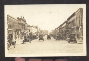 RPPC INDEPENDENCE IOWA DOWNTOWN STREET SCENE OLD CAR VINTAGE REAL PHOTO POSTCARD