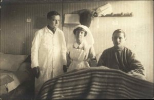 Doctor Nurse and Soldier Military Hospital Real Photo RPPC Vintage Postcard