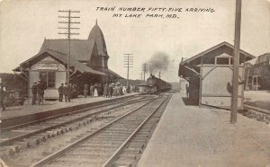 TRAIN NUMBER 55 ARRIVING  MT. LAKE PARK MARYLAND TRAIN DEPOT POSTCARD (1910)