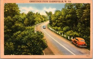 Postcard WV - Greetings from Harrisville - cars on country road