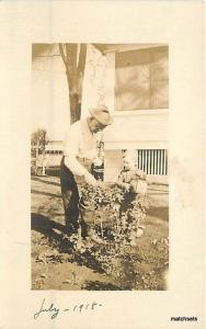 1918 Man & Son gardening RPPC Postcard 8202