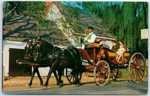 M-62848 Mulberry Phaeton passing the Deane Forge Williamsburg Virginia