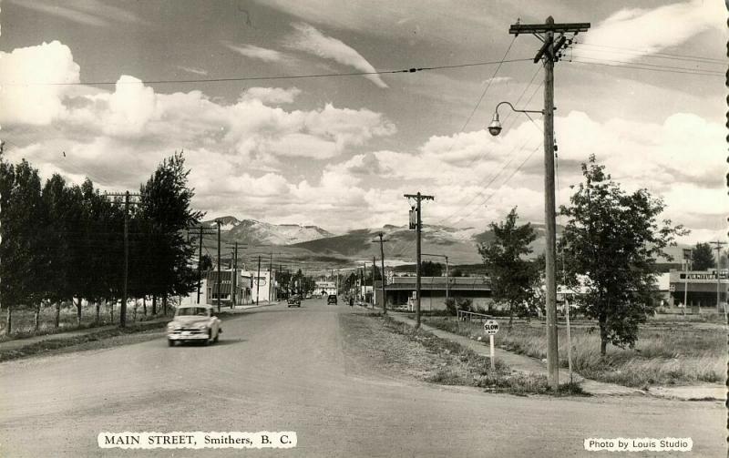 canada, SMITHERS, B.C., Main Street, Car (1960s) Louis Studio RPPC Postcard