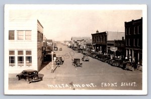 J89/ Malta Montana RPPC Postcard c1940s Front Street Stores  312