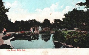 VINTAGE POSTCARD PEOPLE GATHERING AROUND THE LILY POND AT BELLE ISLE MICHIGAN