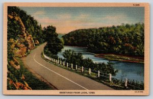 Greetings From Leon Iowa~Road Alongside River~Postmarked~Vintage Linen Postcard