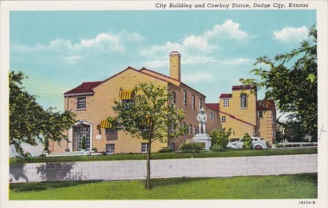 Kansas Dodge City City Building and Cowboy Statue Curteich