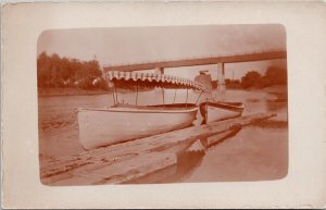 Small Boats Canopy 'Tango' Canada Bridge Unknown Location RPPC Postcard E82