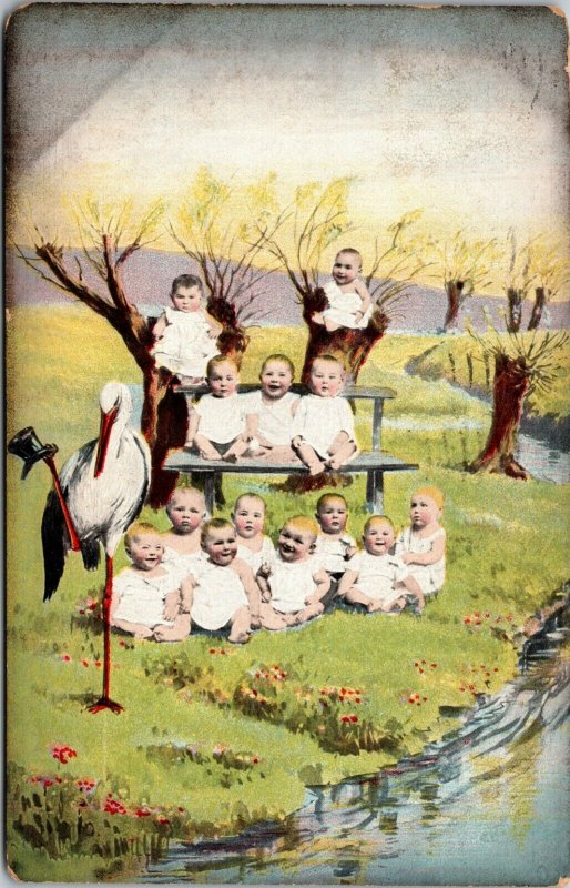 RARE - GROUP OF BABIES BY RIVER - STORK ANTIQUE POSTCARD - VINTAGE POSTED