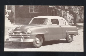 1954 PLYMOUTH PLAZA CLUB SEDAN VINTAGE CAR DEALER ADVERTISING POSTCARD