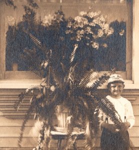 c1910 RPPC Boy Flour Advertising Cap Fern Floral Window Display Real Photo