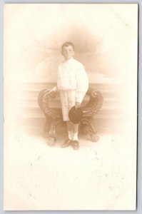 Young Boy Wearing White Sweater Short Pants And Hat Photograph Postcard