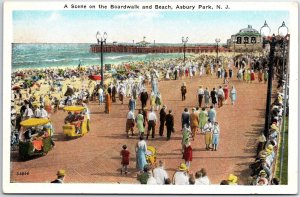 VINTAGE POSTCARD A SCENE ON THE BOARDWALK AND BEACH AT ASBURY PARK 1920s