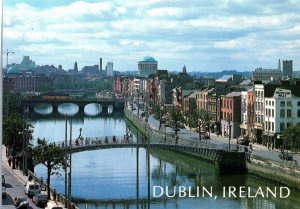 VINTAGE CONTINENTAL SIZE POSTCARD PANORAMIC STREET-LEVEL VIEW OF DUBLIN IRELAND