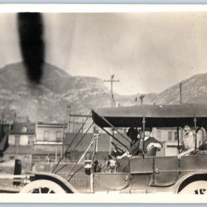 c1910s Touring Car w/ Roof RPPC Girl Smiles Downtown Mountain Real Photo A193