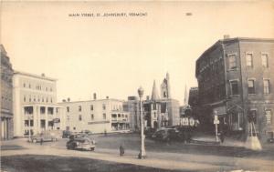 St Johnsbury Vermont~Main Street~Stores~Road Signs~Lampposts~40s Cars~Postcard