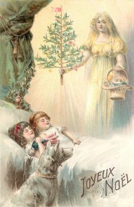 Embossed Christmas Angelic Figure Brings Tree to Sleeping Children Dog PFB 3736