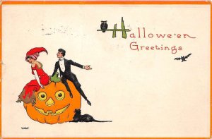 Hallowe'en Greetings Couple Sits Atop Jack-O-Lantern, W/ black Cat, PC U13126