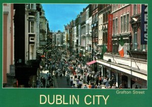 VINTAGE CONTINENTAL SIZE POSTCARD CROWDS ON STREET-LEVEL VIEW OF DUBLIN IRELAND