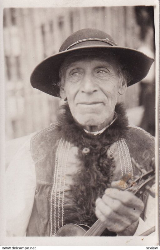 RP; 1900-1920's; Portrait Of older person with violin