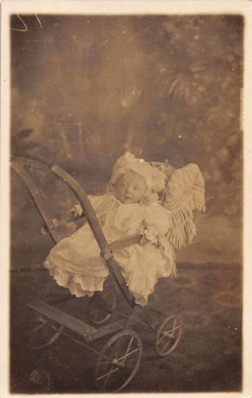 Baby in Wooden Stroller Real Photo Antique Postcard J79761