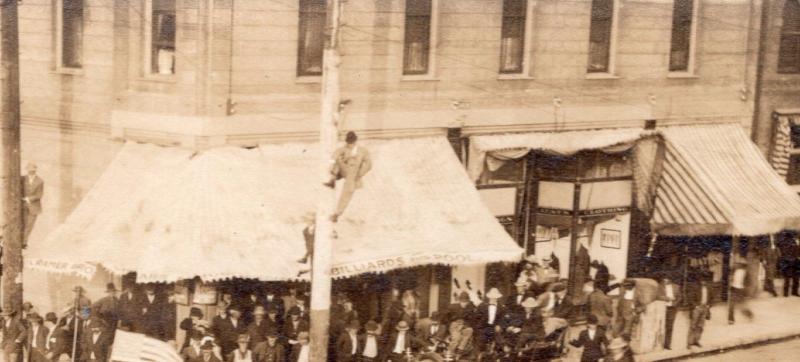 Eating Watermelon. The Dalles, OR Real Photo Postcard Billiards Awning. Cars