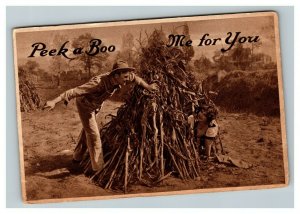 Vintage 1900's Photo Postcard Couple Playing Hide & Seek Woman Hiding Humorous