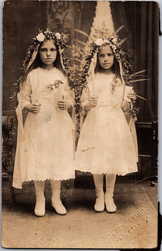 Fabulous double communion portrait two angry girls Hazelton PA RPPC The Shining