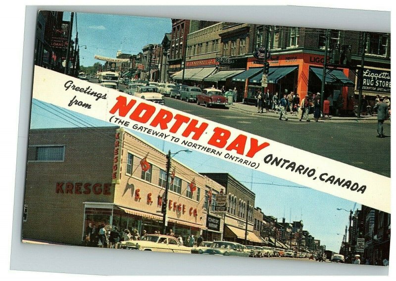 1950s-60s Postcard North Bay Ontario Canada Main St Split View Storefront Cars 