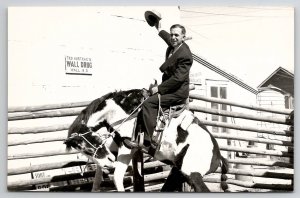 Wall SD Ted Hustead Wall Drug Store Yard Cowboy on Horseback RPPC Postcard L35