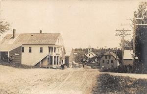 Sherman Mills ME Main Street Storefronts Horse in 1910 Real Photo Postcard