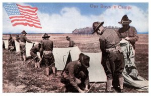 WWI  Soldiers, erecting tents , American Flag