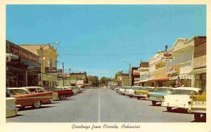 Hale Street Ginsberg & Nyal Drug Stores Cars Osceola Arkansas 1960s postcard