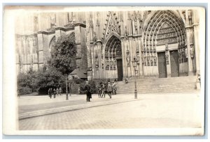 c1920's In Front of Closed Door Building Uniformed Men RPPC Photo Postcard