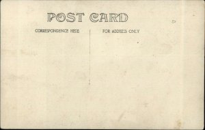 Group of Girls Children Sewing & Reading c1910 Real Photo Postcard