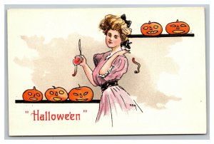 Vintage 1900's German Made Halloween Postcard Beautiful Woman Carving Pumpkins