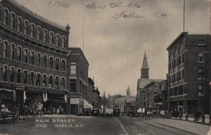 13642 Trolley Car & Horse Carts on Main Street, Nashua, New Hampshire, 1907