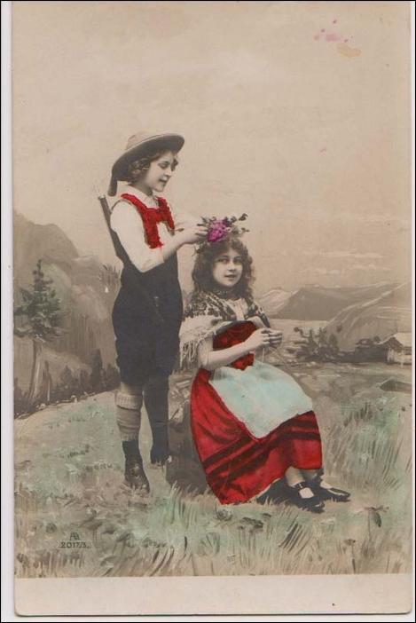 Boy Putting a Wreath on Girl's Head