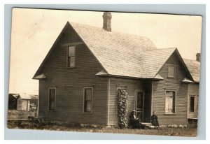 Vintage 1910's RPPC Postcard - Couple Sits in Front of their Farmhouse